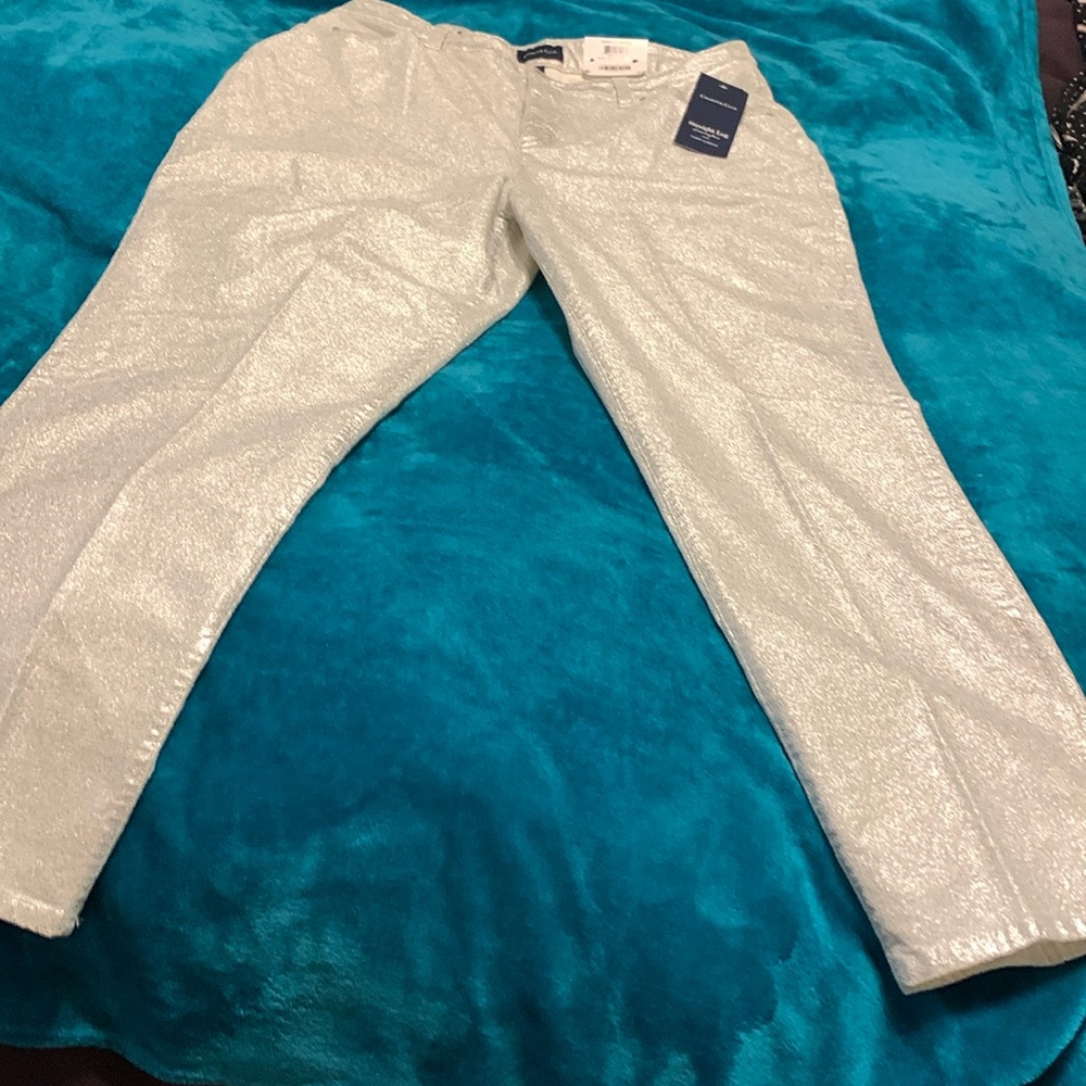 Silver jeans, with tags, straight leg.